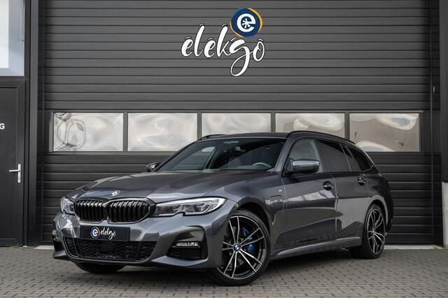 Grijs Gebruikt 2021 BMW 330 Executive Stationwagen | € 32.950 (Iets duurder) - Afbeelding 1/4