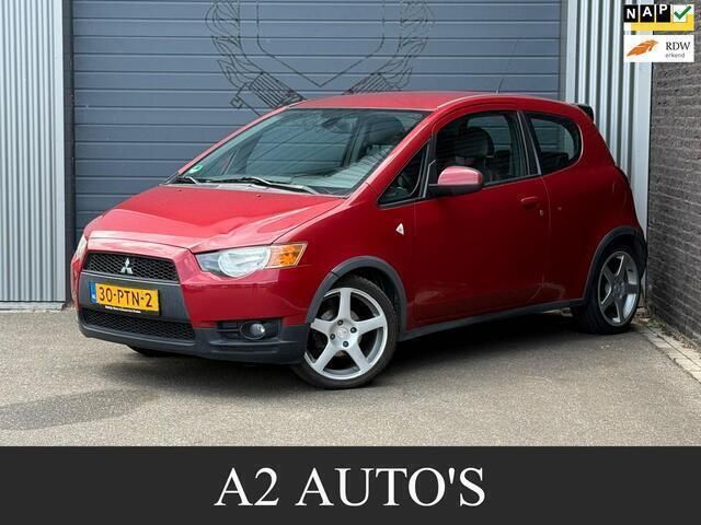 Rood Gebruikt 2011 Mitsubishi Colt Edition Hatchback | € 2.950 (Goede deal) - Afbeelding 1/4