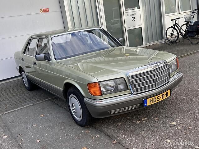 Groen Gebruikt 1986 Mercedes S260 SE Sedan | € 17.950 - Afbeelding 1/4