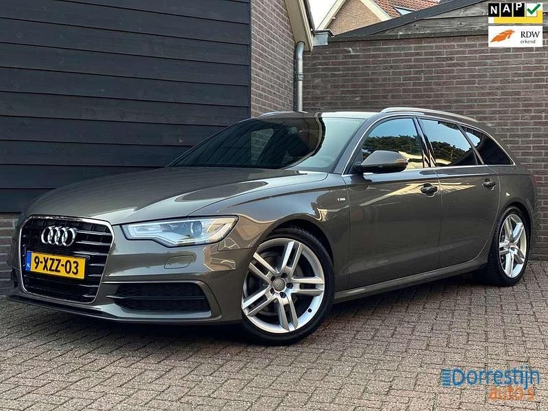 Grijs Gebruikt 2014 Audi A6 Sport Stationwagen | € 19.950 (Duur) - Afbeelding 1/4