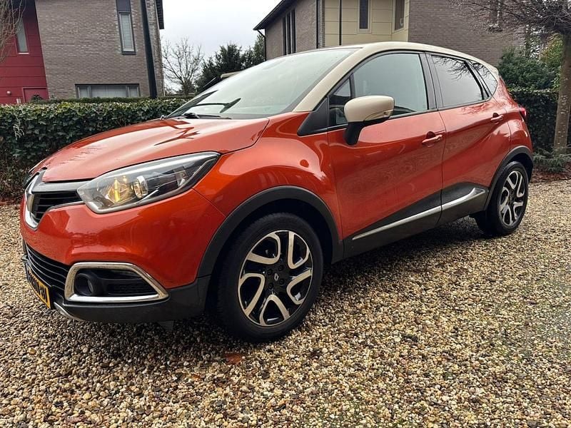 Oranje Gebruikt 2013 Renault Captur Dynamique SUV | € 5.775 (Goede deal) - Afbeelding 1/4
