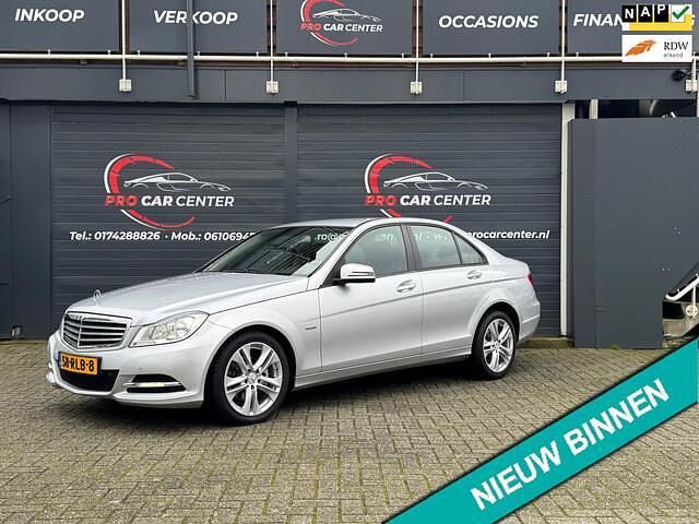Grijs (metallic) Occasion 2011 Mercedes C200 Business Sedan | € 10.999 (Eerlijke prijs) - Afbeelding 1/4