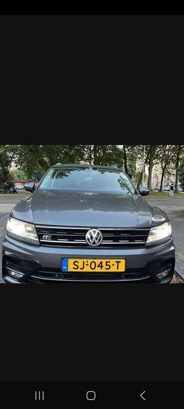 Grijs Gebruikt 2018 VW Tiguan Highline SUV | € 23.500 (Goede deal) - Afbeelding 1/4