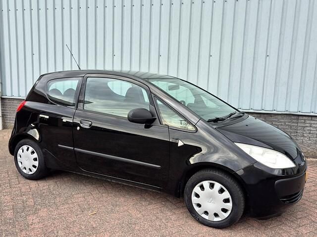 Zwart Gebruikt 2005 Mitsubishi Colt Hatchback | € 1.795 (Iets duurder) - Afbeelding 1/4