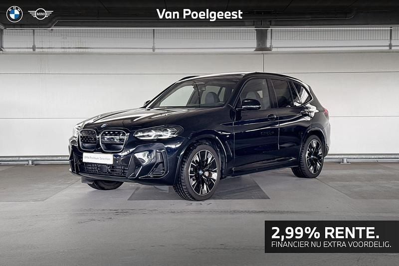 M carbonschwarz Gebruikt 2024 BMW iX3 Executive SUV | € 57.900 (Eerlijke prijs) - Afbeelding 1/4