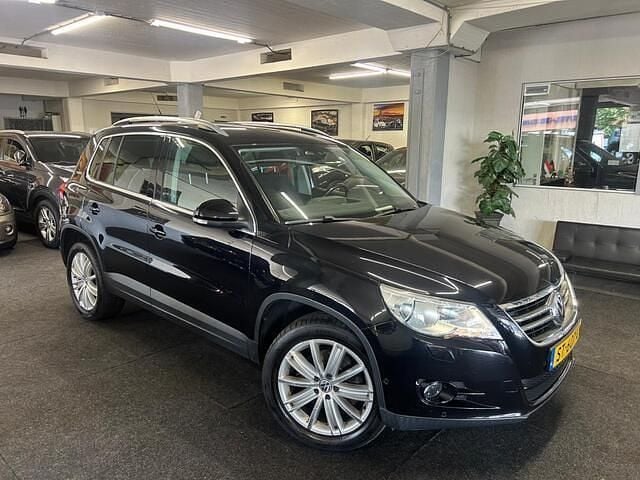 Zwart Gebruikt 2010 VW Tiguan Comfortline SUV | € 5.795 (Goede deal) - Afbeelding 1/4