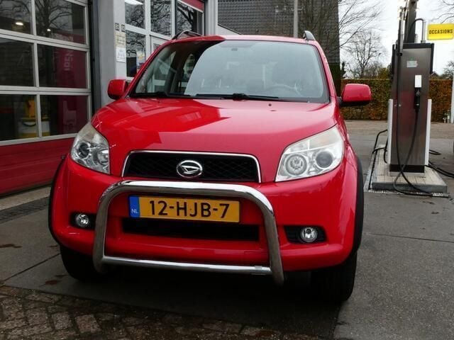Rood Gebruikt 2009 Daihatsu Terios SUV | € 7.500 (Eerlijke prijs) - Afbeelding 1/4