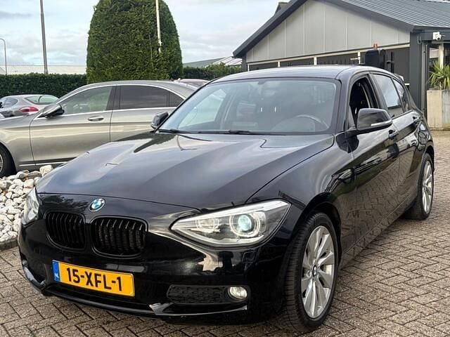 Zwart Gebruikt 2012 BMW 116 Hatchback | € 7.950 (Eerlijke prijs) - Afbeelding 1/4