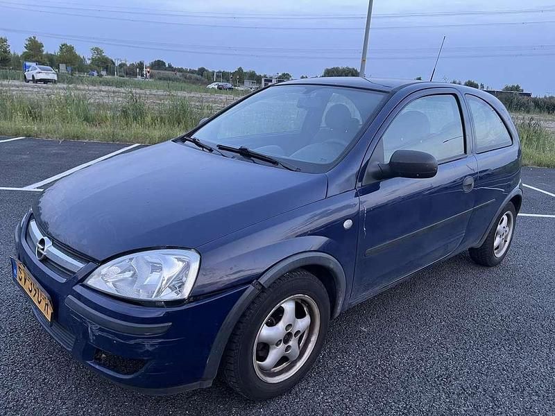 Blauw, metallic lak Gebruikt 2003 Opel Corsa Hatchback | € 599 (Goede deal) - Afbeelding 1/4