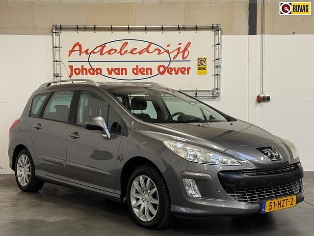 Grijs Gebruikt 2009 Peugeot 308 SW Stationwagen | € 1.750 (Goede deal) - Afbeelding 1/4
