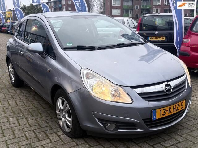 Grijs Gebruikt 2009 Opel Corsa Enjoy Hatchback | € 1.899 (Goede deal) - Afbeelding 1/4