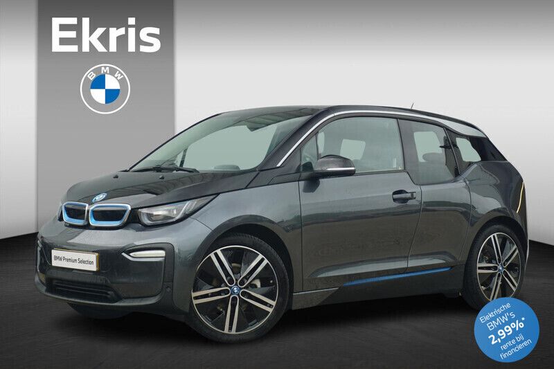 Grijs, metallic lak Gebruikt 2021 BMW i3 Executive Hatchback | € 19.350 (Eerlijke prijs) - Afbeelding 1/4