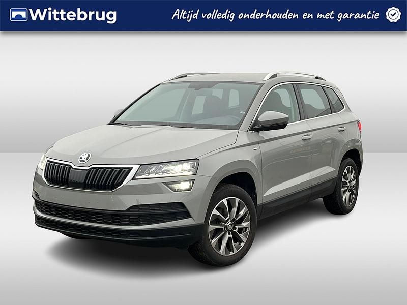 Grijs (metallic) Gebruikt 2021 Skoda Karoq Ambition SUV | € 28.450 (Eerlijke prijs) - Afbeelding 1/2