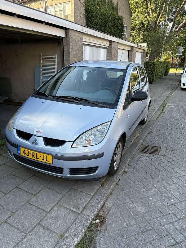 Blauw Gebruikt 2005 Mitsubishi Colt Stationwagen | € 950 (Iets duurder) - Afbeelding 1/4