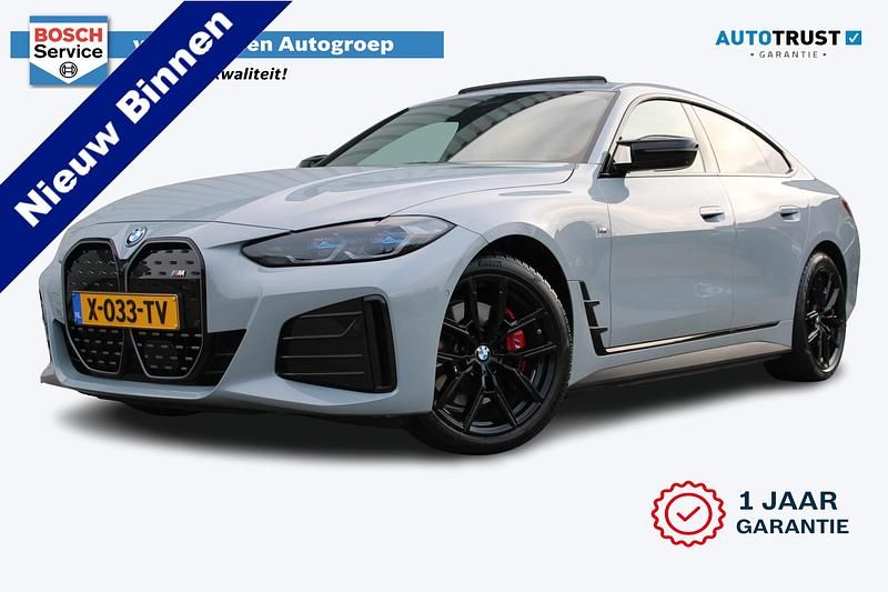 Grijs (metallic) Occasion 2024 BMW i4 Executive Sedan | € 59.450 (Iets duurder) - Afbeelding 1/4