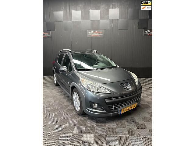 Grijs Gebruikt 2010 Peugeot 207 Outdoor Outdoor Stationwagen | € 2.450 (Goede deal) - Afbeelding 1/4