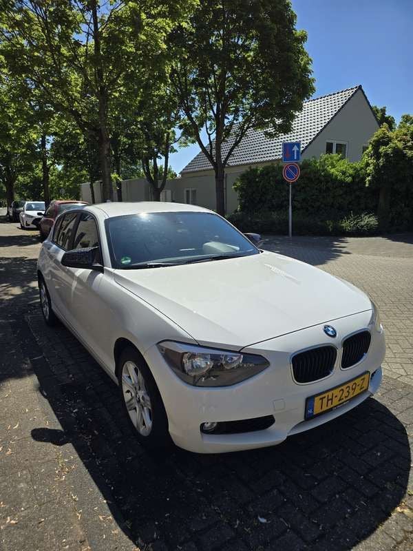Wit Gebruikt 2014 BMW 114 Executive Hatchback | € 7.400 (Goede deal) - Afbeelding 1/4