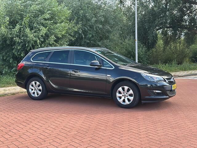 Occasion Opel Astra Business 110 PK (80 kW) 2015 Zwart Stationwagen