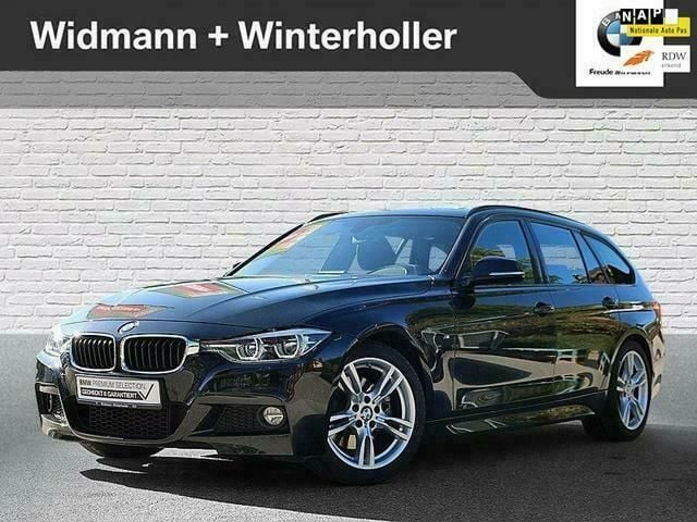 Zwart Occasion 2019 BMW 330 M Sport Stationwagen | € 39.950 (Duur) - Afbeelding 1/4