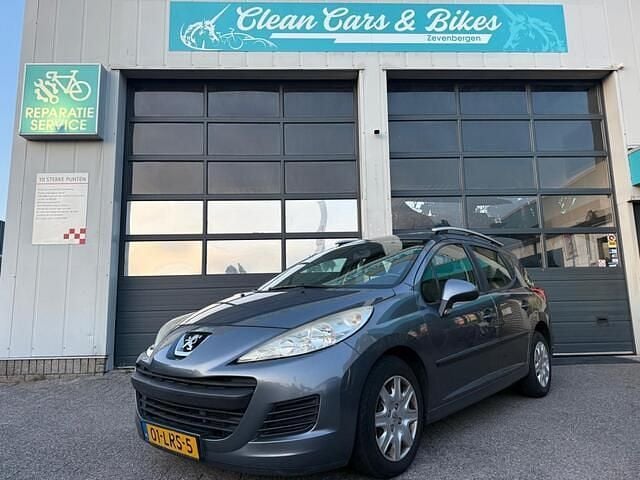 Grijs Gebruikt 2010 Peugeot 207 Stationwagen | € 1.650 (Eerlijke prijs) - Afbeelding 1/4