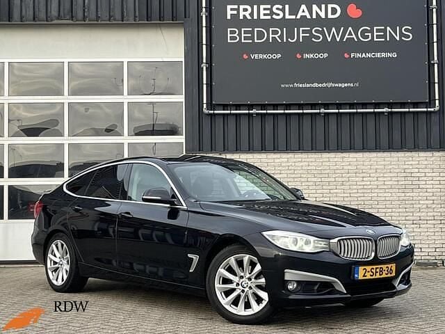 Zwart Occasion 2013 BMW 320 Executive Hatchback | € 8.950 (Goede deal) - Afbeelding 1/4