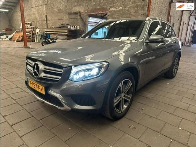 Grijs Gebruikt 2016 Mercedes GLC220 Prestige SUV | € 21.500 (Eerlijke prijs) - Afbeelding 1/4