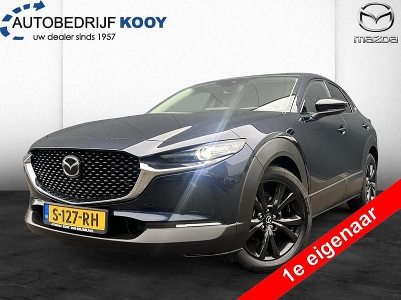 Blauw (metallic) Gebruikt 2023 Mazda CX-30 Homura-Line SUV | € 30.450 (Eerlijke prijs) - Afbeelding 1/4