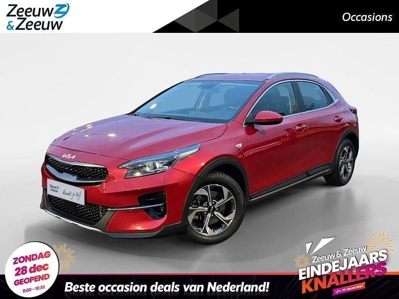 True red metallic (aa9) Gebruikt 2022 Kia XCeed Comfort SUV | € 16.440 (Eerlijke prijs) - Afbeelding 1/4