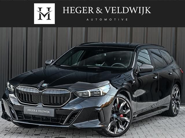 Zwart Gebruikt 2025 BMW 550e M Sport Stationwagen | € 96.900 (Super prijs) - Afbeelding 1/4