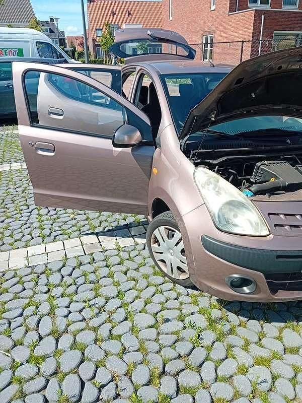 Beige Gebruikt 2010 Nissan Pixo Acenta Hatchback | € 2.200 (Eerlijke prijs) - Afbeelding 1/4