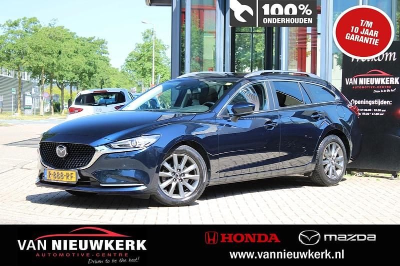 Deep chrysthal blue (blauw mica) Occasion 2022 Mazda 6 Stationwagen | € 26.725 (Goede deal) - Afbeelding 1/4