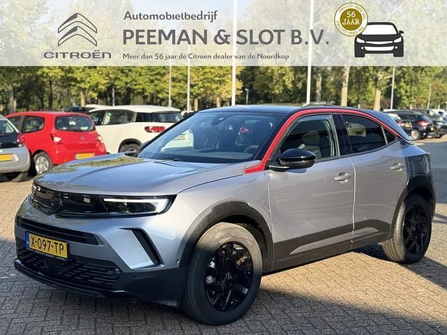 Grijs Gebruikt 2024 Opel Mokka-e SUV | € 21.950 (Eerlijke prijs) - Afbeelding 1/4