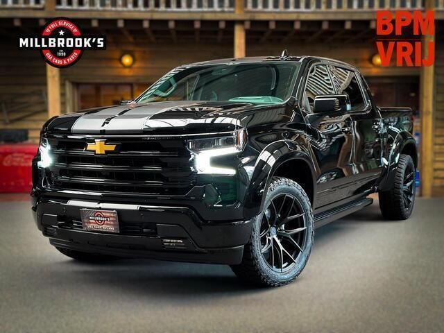 Zwart Nieuw 2024 Chevrolet Silverado Van | € 89.950 - Afbeelding 1/4