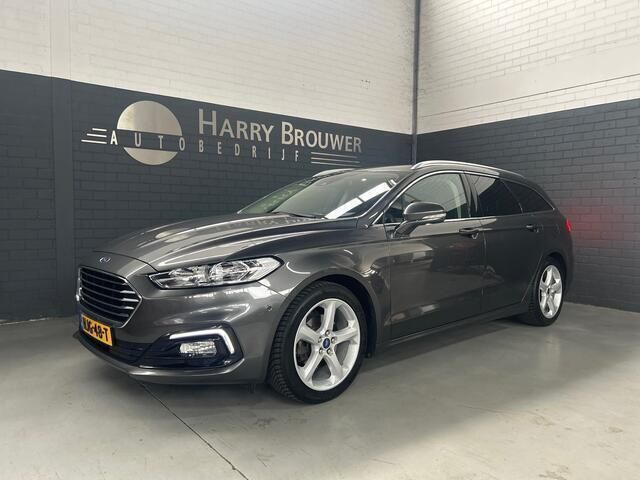 Grijs, metallic lak Gebruikt 2019 Ford Mondeo Titanium Stationwagen | € 19.599 (Eerlijke prijs) - Afbeelding 1/4