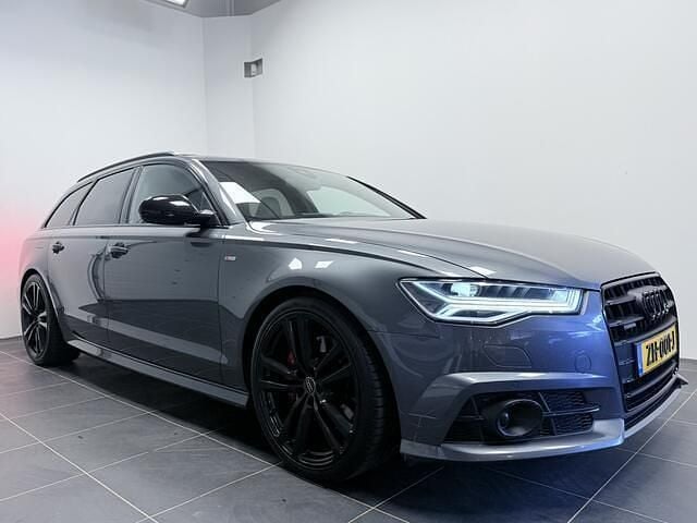 Grijs Gebruikt 2018 Audi A6 Sport Stationwagen | € 26.900 (Goede deal) - Afbeelding 1/4