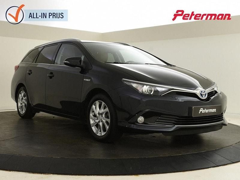 Grijs Gebruikt 2015 Toyota Auris Touring Sports Stationwagen | € 13.499 (Eerlijke prijs) - Afbeelding 1/4