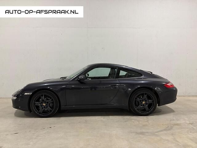 Grijs (metallic) Occasion 2007 Porsche 911 Carrera Coupé | € 33.495 (Goede deal) - Afbeelding 1/4