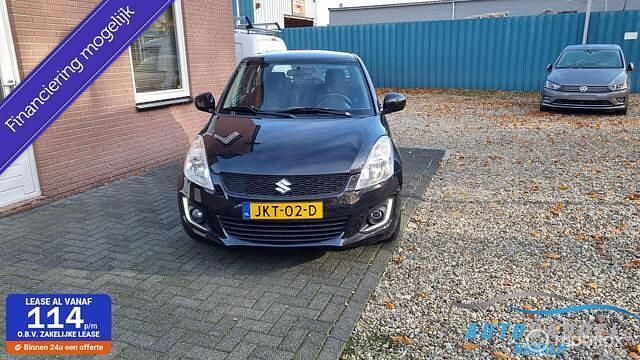 Zwart (metallic) Gebruikt 2015 Suzuki Swift Comfort Hatchback | € 6.950 (Goede deal) - Afbeelding 1/4