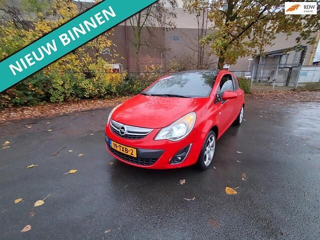 Rood Gebruikt 2012 Opel Corsa Color Edition Hatchback | € 999 (Goede deal) - Afbeelding 1/4