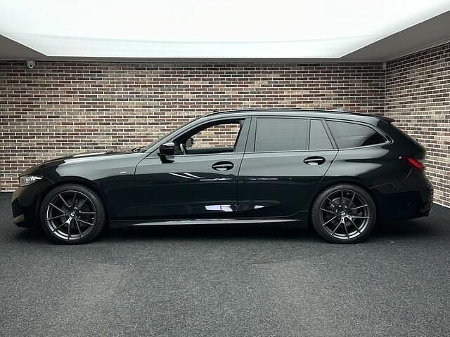 Occasion BMW 320 M Performance 184 PK (135 kW) 2023 Zwart Stationwagen