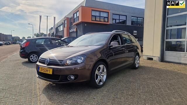Bruin Gebruikt 2012 VW Golf VII Highline Stationwagen | € 5.250 (Goede deal) - Afbeelding 1/4