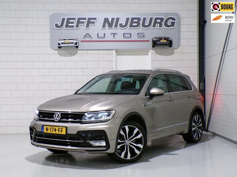Bruin Occasion 2017 VW Tiguan Highline SUV | € 23.999 (Goede deal) - Afbeelding 1/4