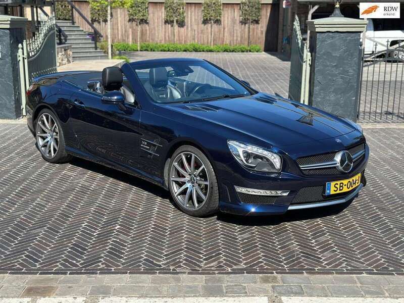 Blauw, metallic lak Gebruikt 2012 Mercedes SL63 AMG AMG Cabriolet | € 72.450 - Afbeelding 1/4