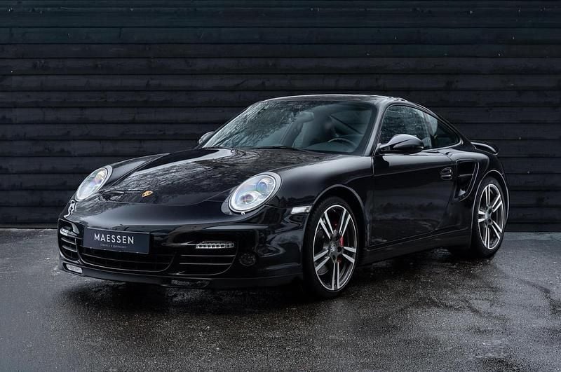 Zwart Gebruikt 2010 Porsche 911 Sport Coupé | € 109.950 - Afbeelding 1/4