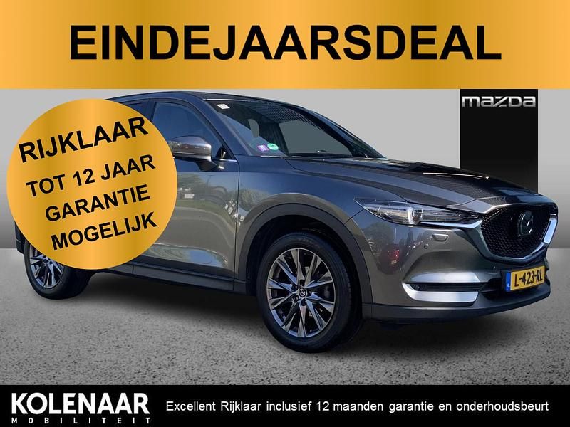 Grijs Gebruikt 2021 Mazda CX-5 Signature SUV | € 27.895 (Eerlijke prijs) - Afbeelding 1/4