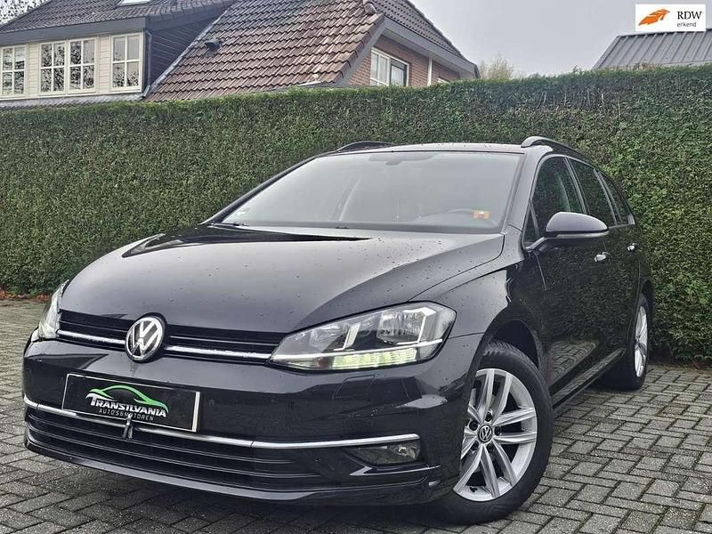 Zwart Gebruikt 2017 VW Golf VII Comfortline Stationwagen | € 9.999 (Super prijs) - Afbeelding 1/4