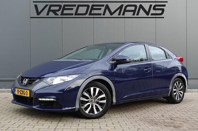 Blauw (metallic) Occasion 2013 Honda Civic Comfort Hatchback | € 3.750 - Afbeelding 1/4