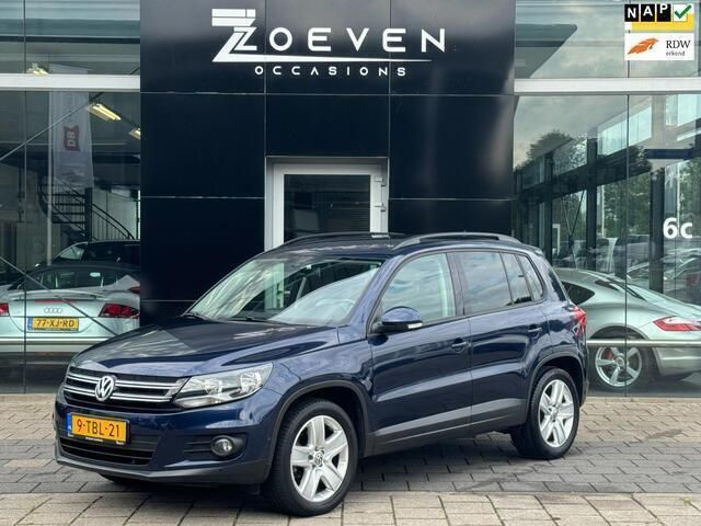Blauw Gebruikt 2014 VW Tiguan Comfortline SUV | € 7.995 (Goede deal) - Afbeelding 1/4