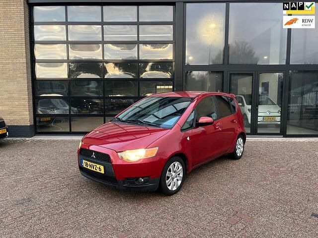 Rood Gebruikt 2009 Mitsubishi Colt Edition Hatchback | € 1.499 (Eerlijke prijs) - Afbeelding 1/4