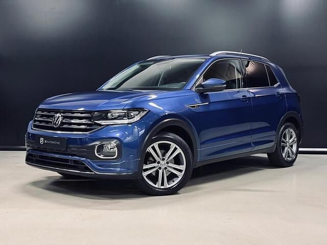 Blauw, metallic lak Gebruikt 2020 VW T-Cross R-line SUV | € 20.950 (Eerlijke prijs) - Afbeelding 1/4